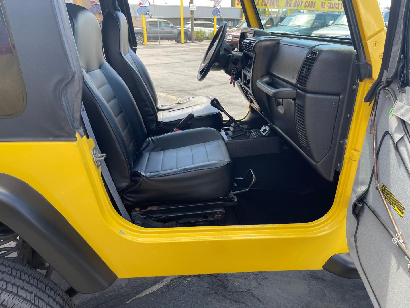 2000 Solar Yellow /Black Jeep Wrangler SE (1J4FA29P9YP) with an 2.5L 4 Cyl. engine, Manual transmission, located at 801 South State Street, Salt Lake City, UT, 84111, (801) 328-0098, 40.751953, -111.888206 - Wow extremely rare to find extra clean Jeep in immaculate condition 4x4! Low miles only 98,248 miles! Interior and exterior are both in excellent shape for the year. This is a clean title no reported accidents on the CarFax history report. It has passed emissions already and is ready to go. Featur - Photo#27